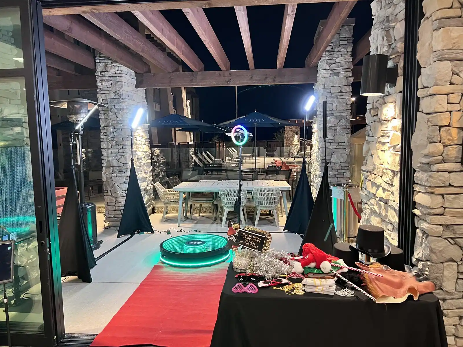 360 video booth set up on a resort patio in the evening